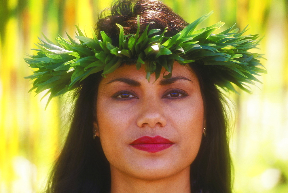 Portrait of a hula dancer wearing a headdress, Hawaii, USA