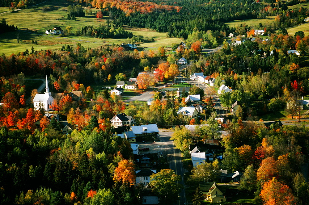 Aerial views of West burke, Vermont showing fall foliage