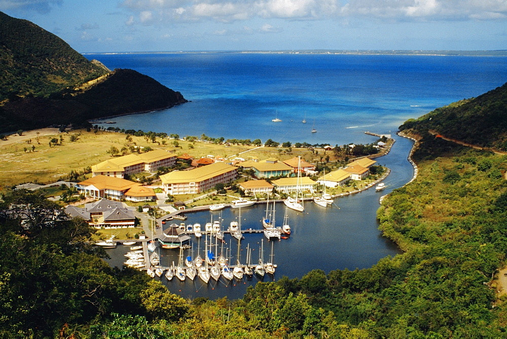 A fleet of ships anchored at a harbor, St. Maarten, Caribbean.