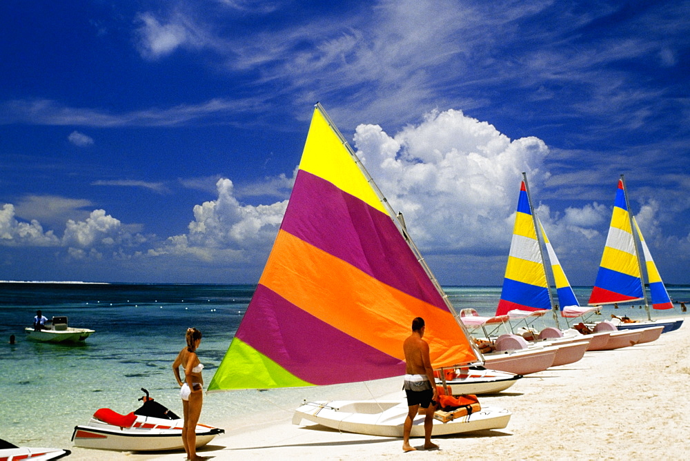 Row of colored sails on a seacoast, Treasure Island, Abaco, Bermuda