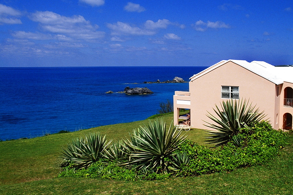 Side view of a pink building facing the ocean, Devonshire north shore, Bermuda