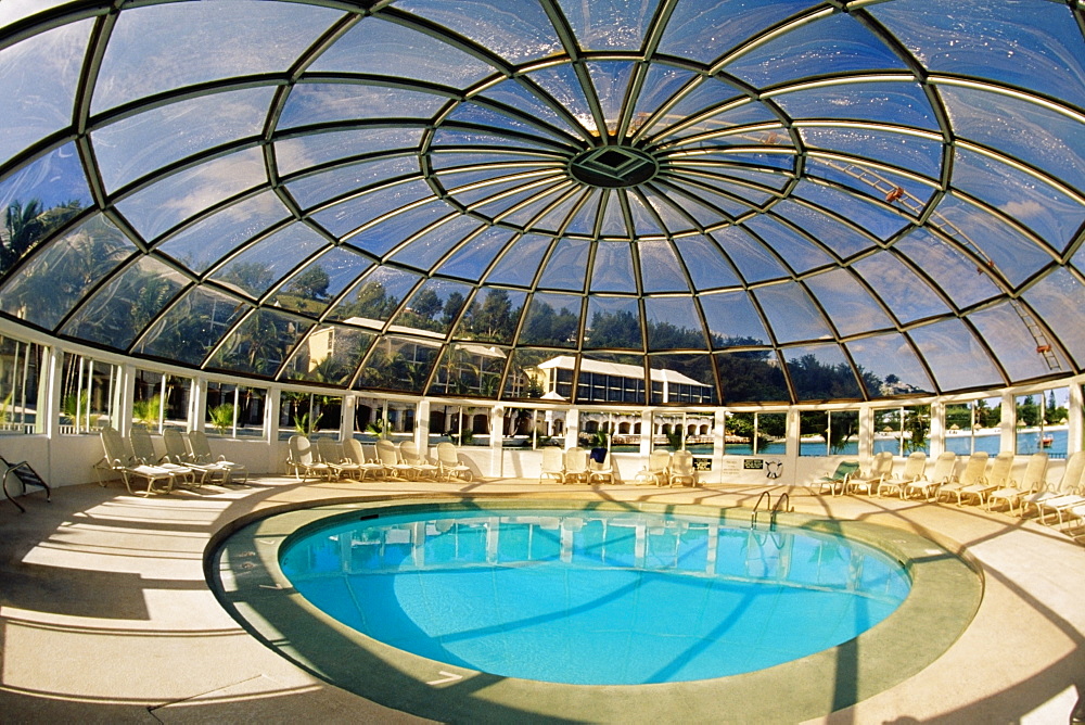 Modern look of a circular swimming pool in Somesta hotel, Bermuda