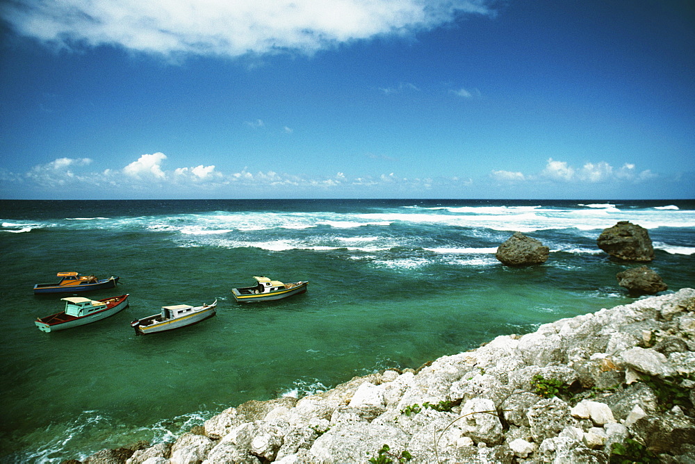 Boats floating near a seashore, Barbados