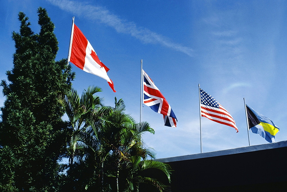 Flags fluttering due to wind on a sunny day, Freeport, Bahamas