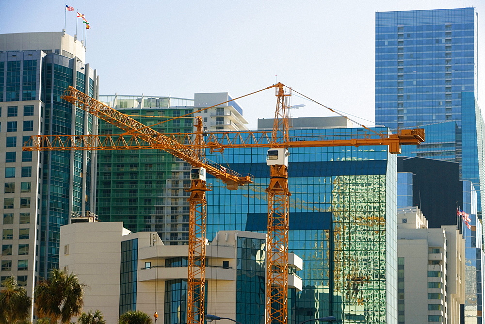 Crane in front of buildings, Miami, Florida, USA