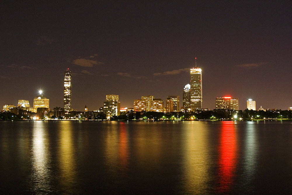 Buildings at the waterfront lit up at night, Boston, Massachusetts, USA