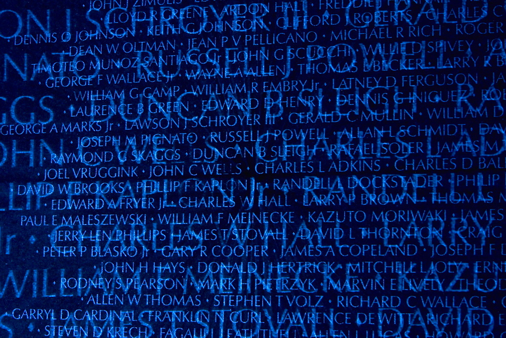 Close-up of a wall with text engraved on it, Vietnam Veterans Memorial, Washington DC, USA