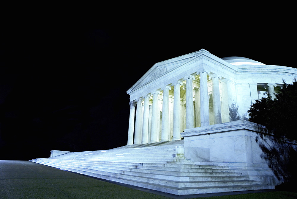 Low angle view of a building lit up at night, Jefferson Memorial, Washington DC, USA