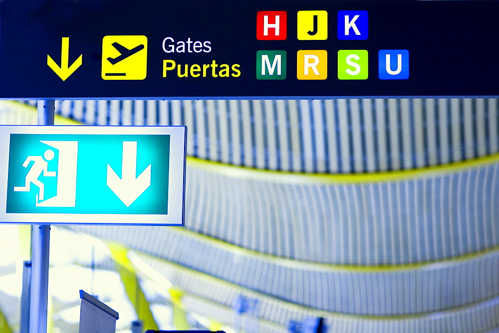 Close-up of an emergency exit sign at an airport, Madrid, Spain