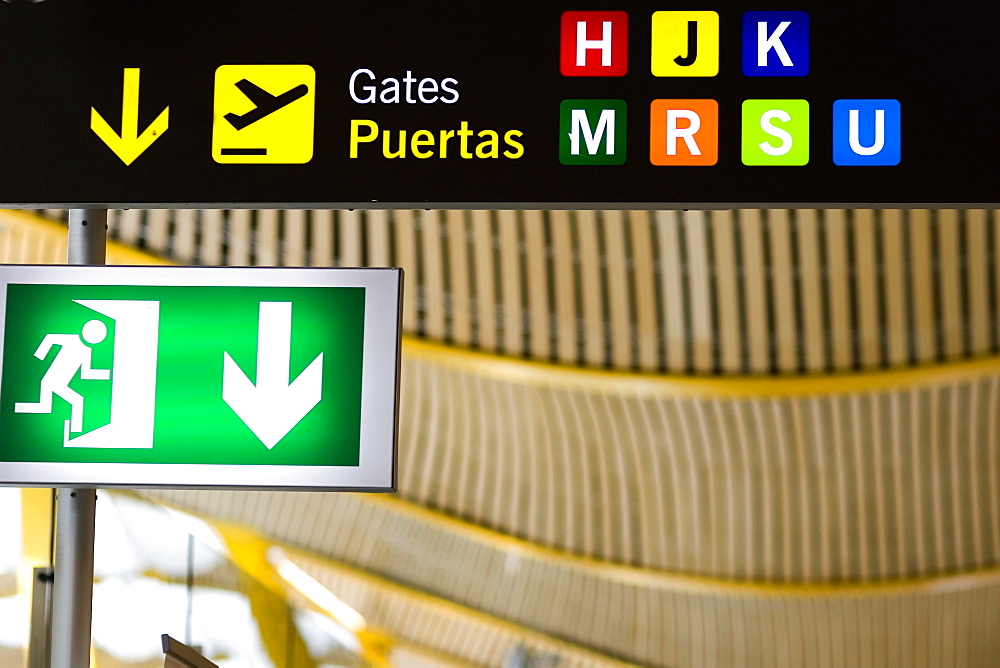 Close-up of an emergency exit sign at an airport, Madrid, Spain