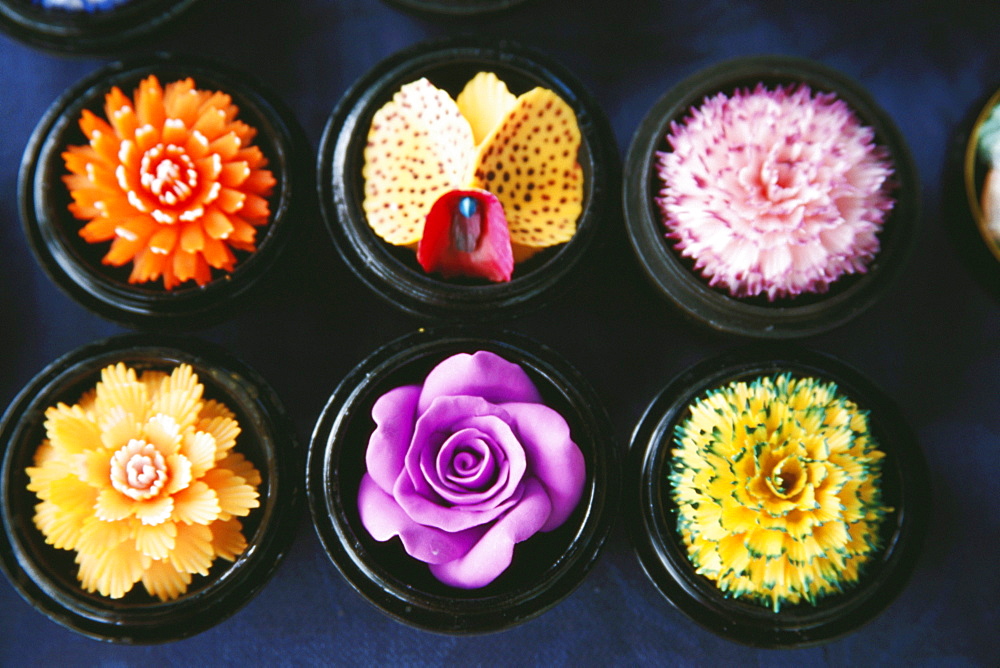 Close-up of flowers carved on soaps