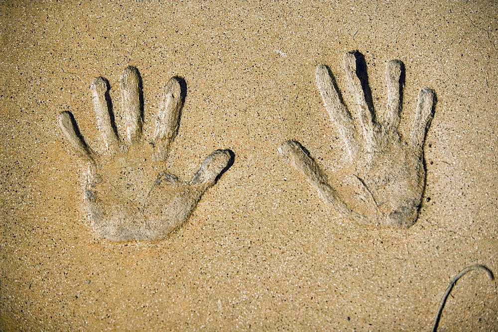 Close-up of handprints in cement at a theater, Mann's Chinese Theater, Los Angeles, California, USA