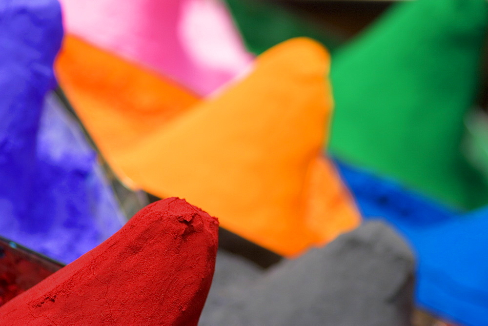 Close-up of mounds of colored powder used for Hindu rituals, Pushkar, Rajasthan, India