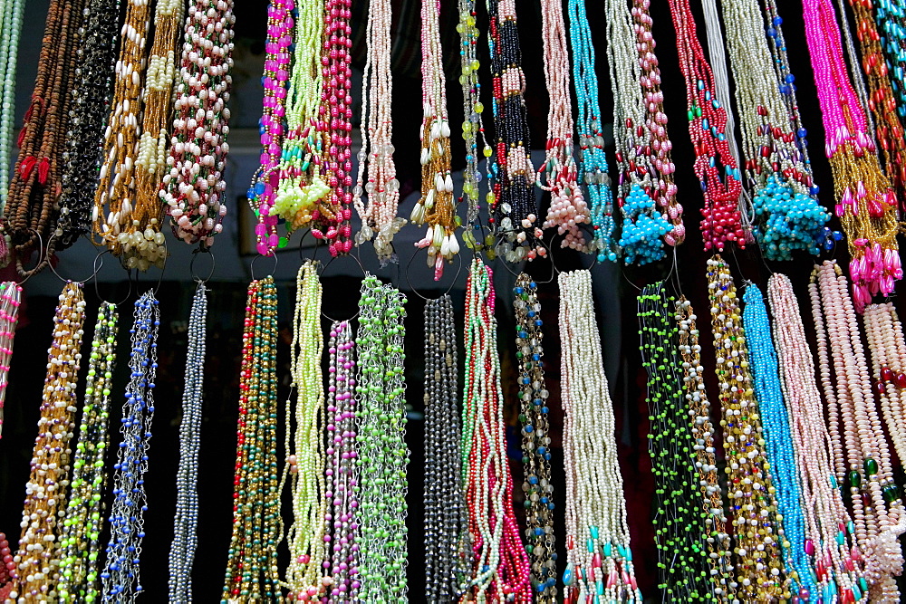 Low angle view of necklaces at a store, Pushkar, Rajasthan, India