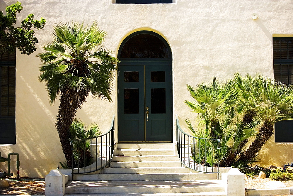 Arched doorway in a stucco building, San Diego, California, USA