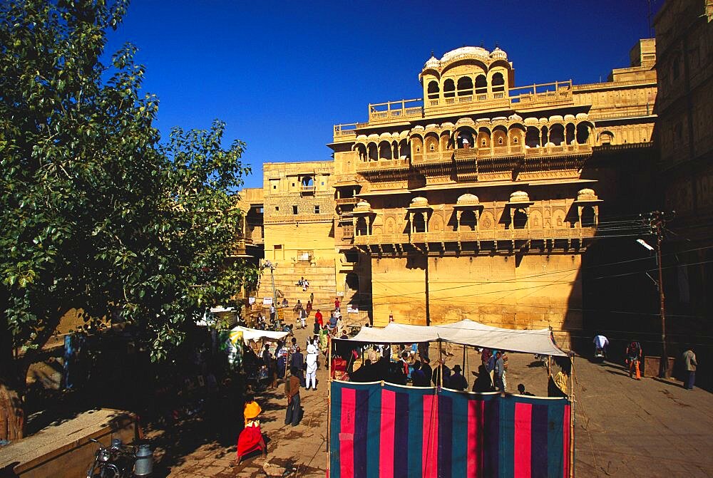 Tourists in a courtyard of a haveli, Haveli Mansion, Golden Fort, Jaisalmer, Rajasthan, India