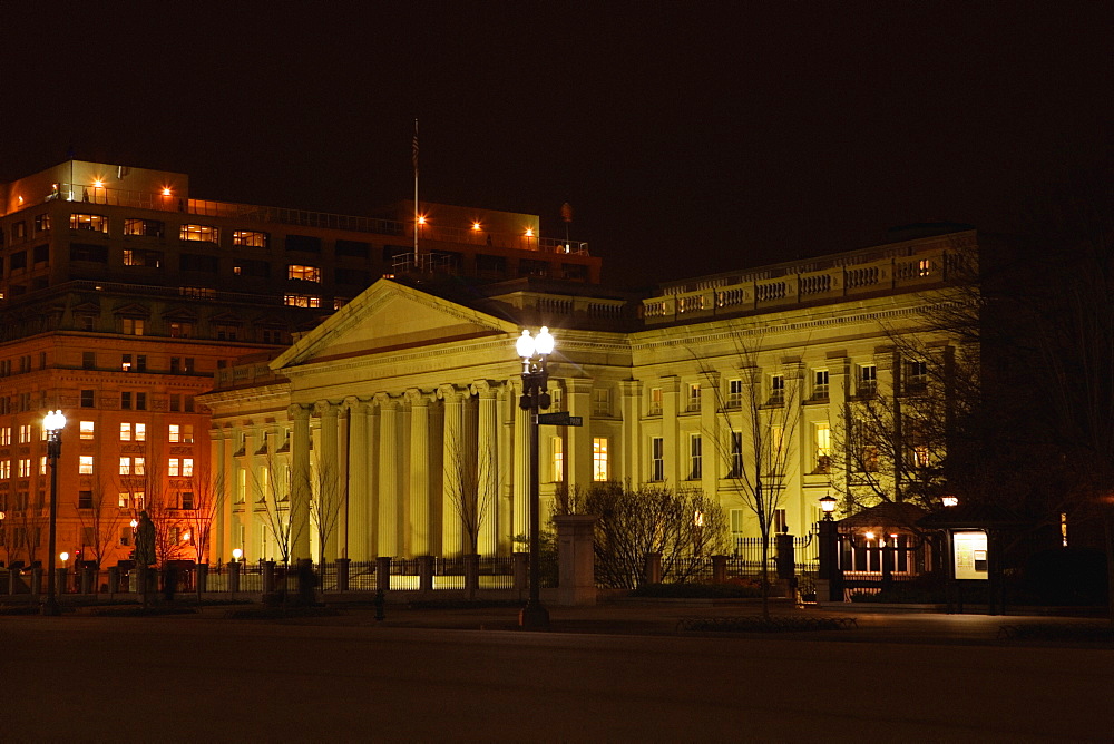 Facade of an art museum lit up at night, National Gallery of Art, Washington DC, USA