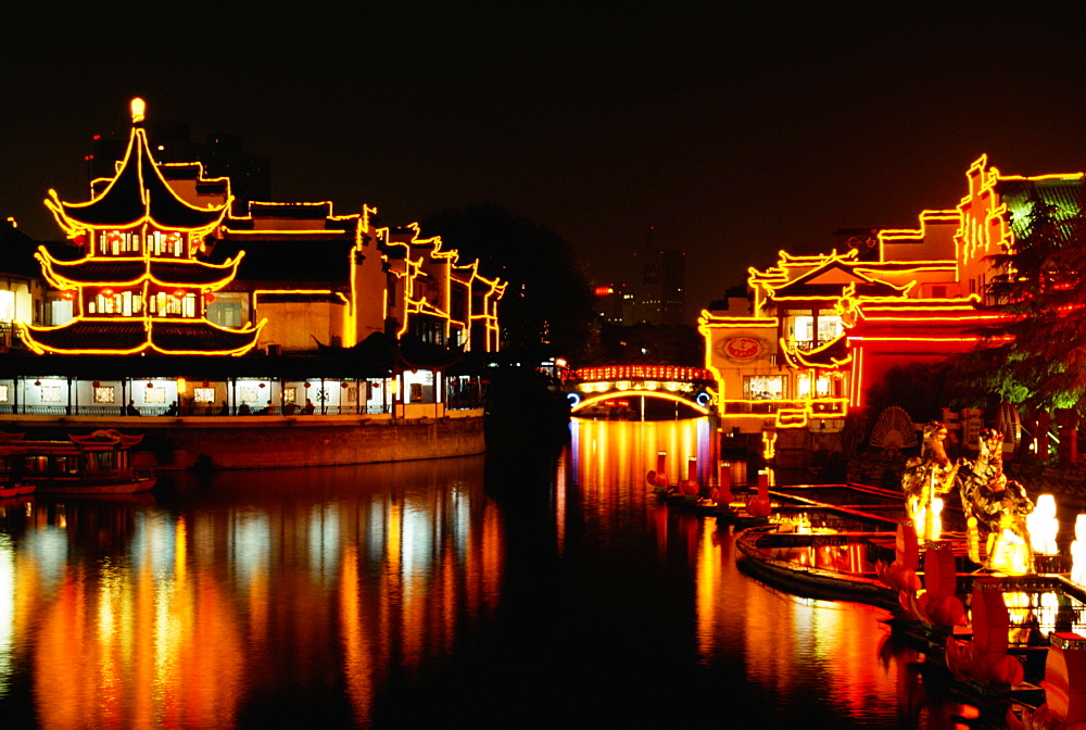 Reflection of an illuminated temple in water, Confucian Temple, Nanjing, Jiangsu Province, China