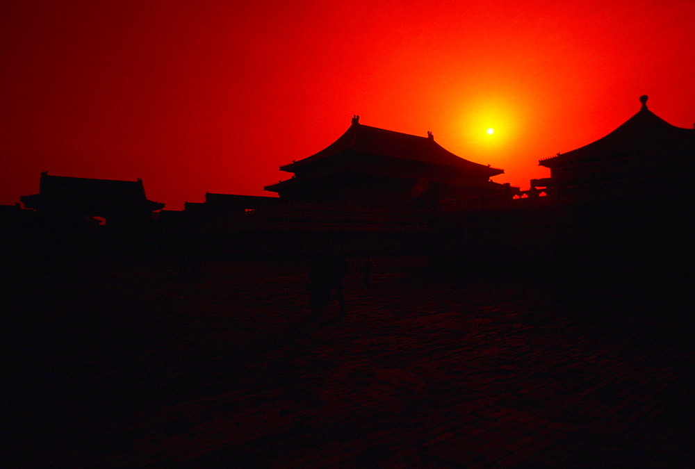 Silhouette of buildings at sunset, Forbidden City, Beijing, China