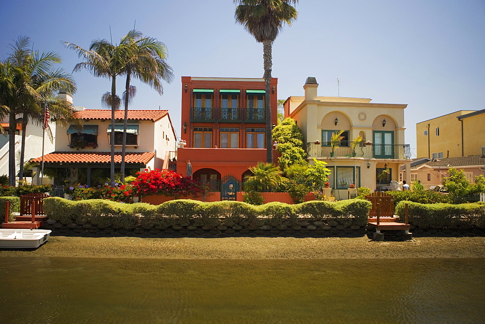 Facade of houses along a canal, Venice, Los Angeles, California, USA