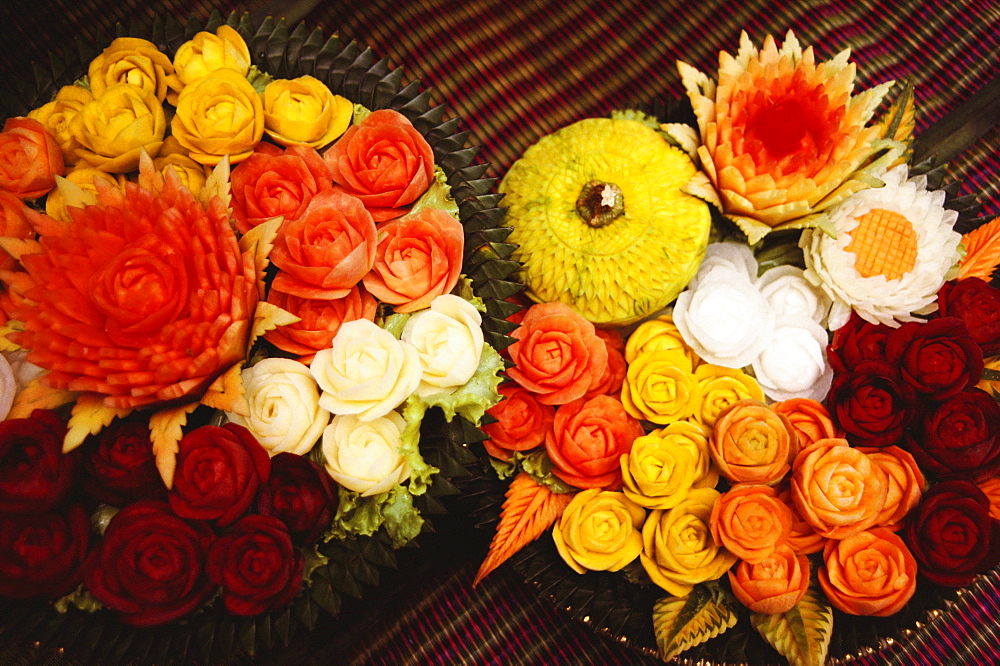 Close-up of flowers carved from vegetables