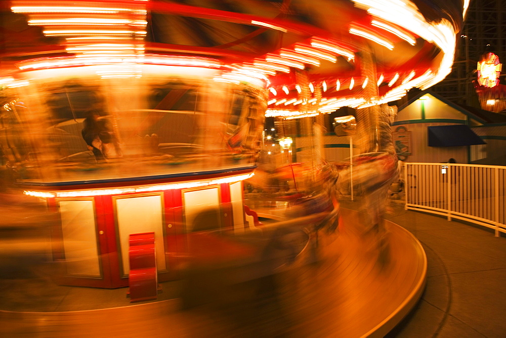 Close-up of a carousel at night