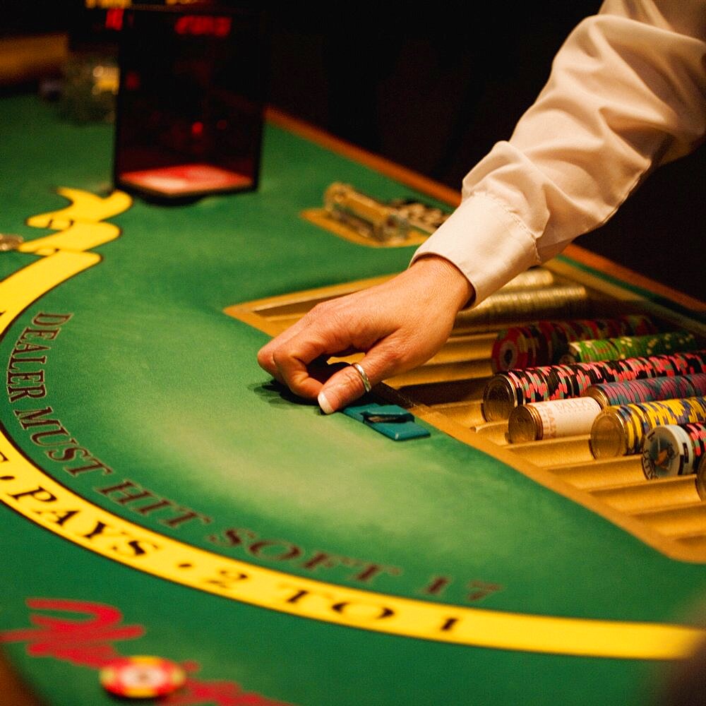 High angle view of a casino dealer dealing at a table, Las Vegas, Nevada, USA