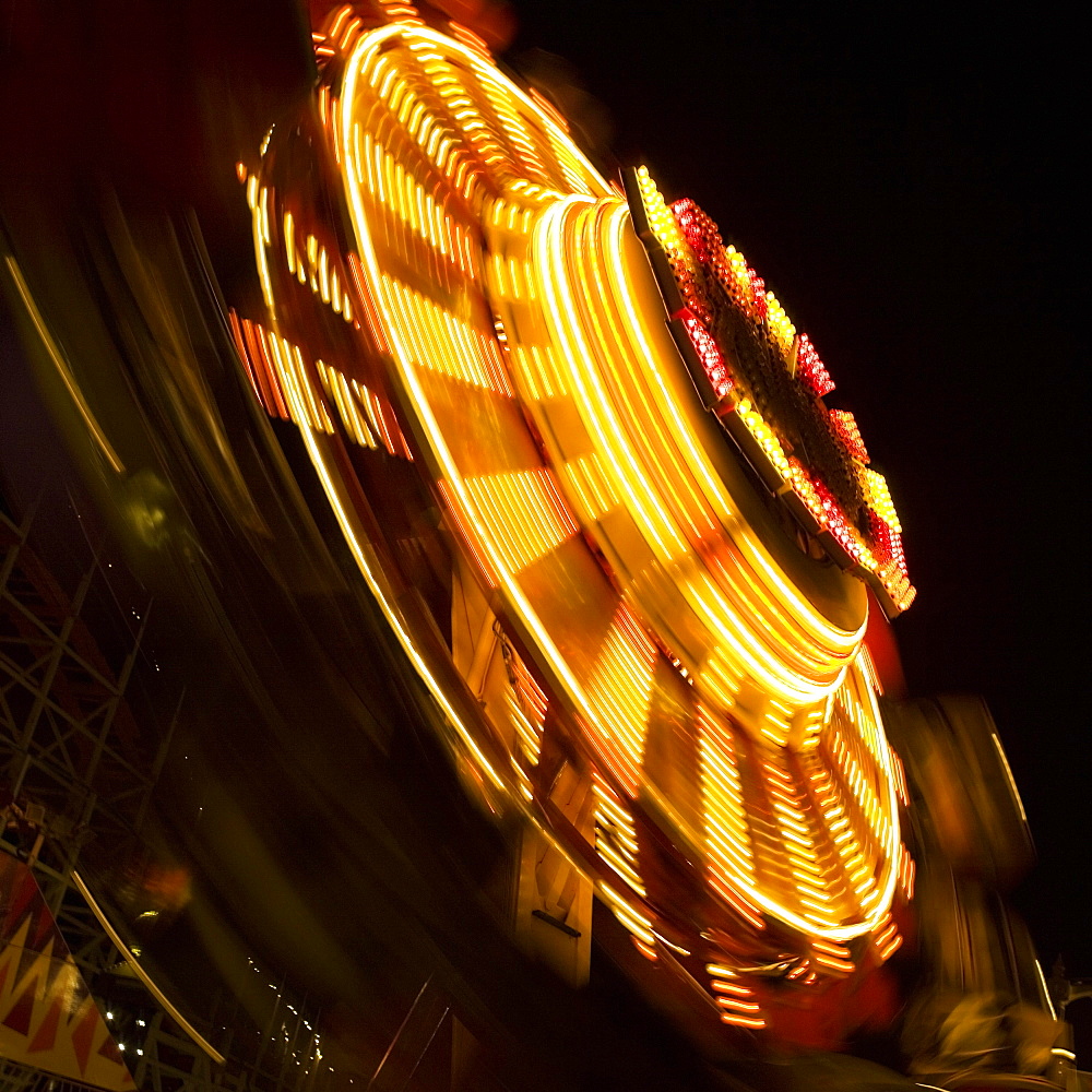 Ride in an amusement park at night, San Diego, California, USA