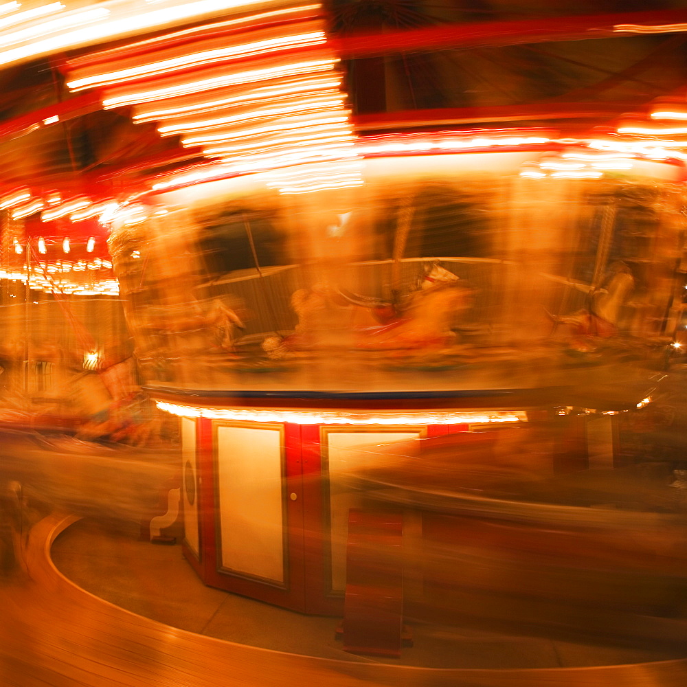 Close-up of a carousel at night, California, USA
