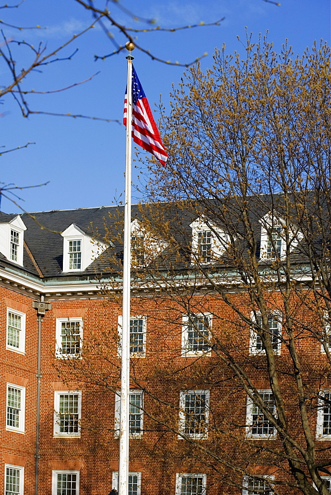 Low angle view of a flag in front of a building, Annapolis, Maryland, USA