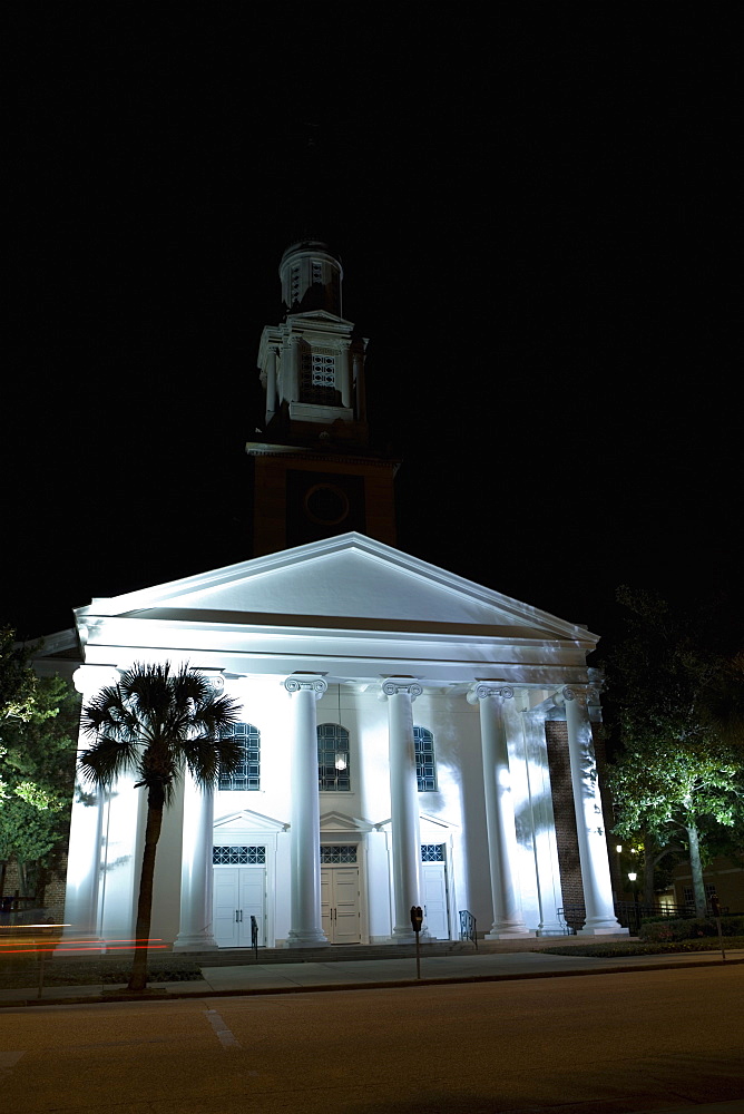 Low angle view of a building lit up at night, Orlando, Florida, USA