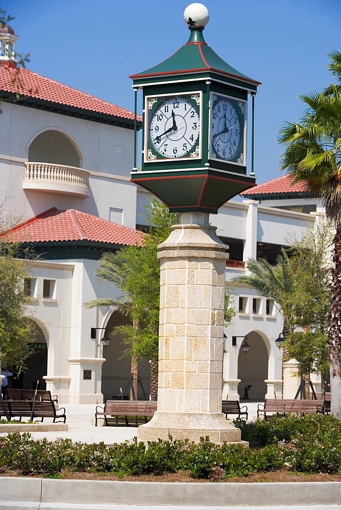 Clock on a column in front of a building, St. Augustine, Florida, USA