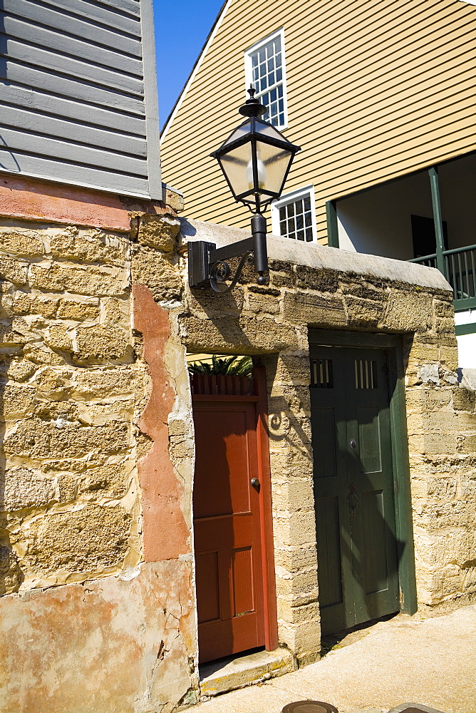 Lantern mounted on the wall of a house