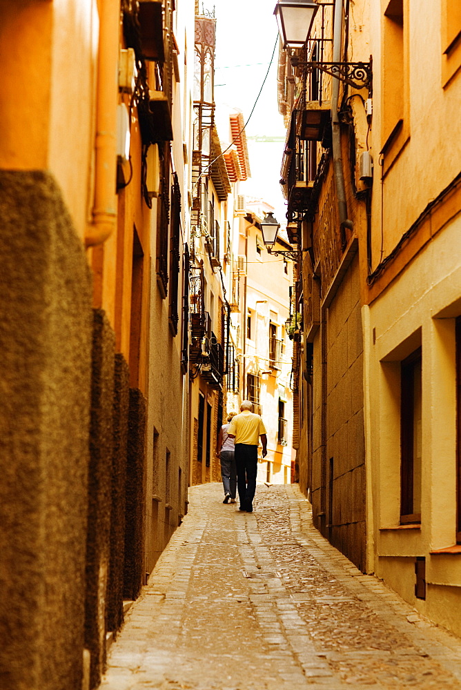 Tourists walking on the street, Toledo, Spain