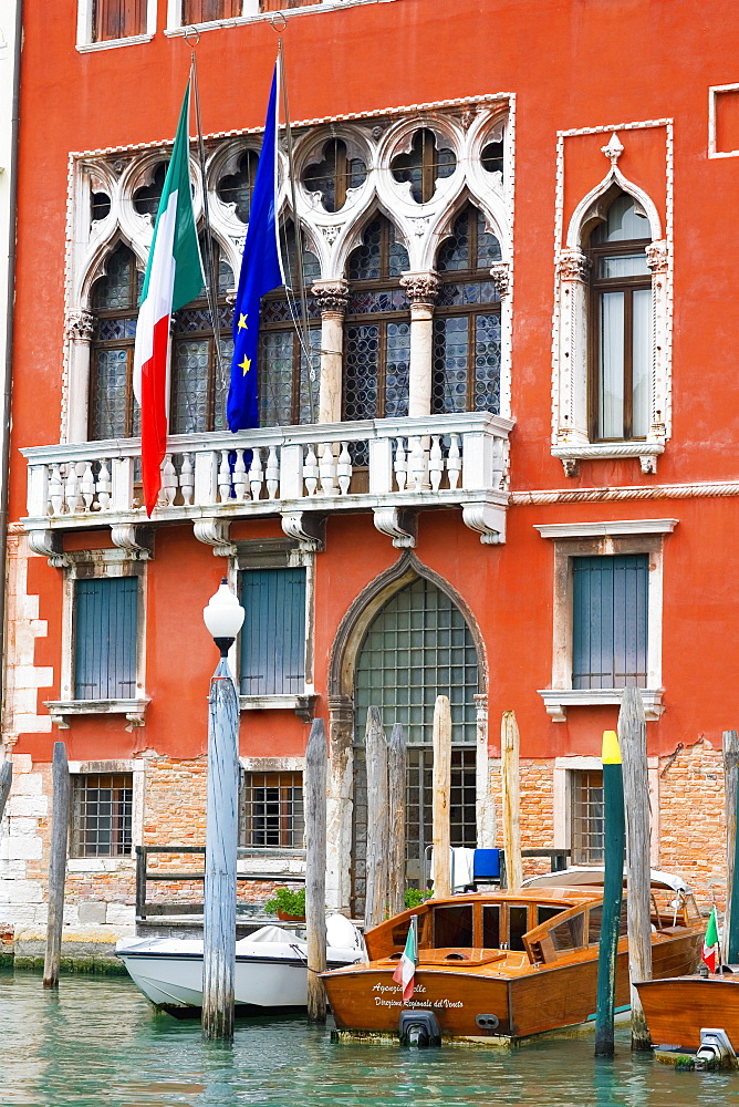 Boats docked in a canal, Venice, Italy