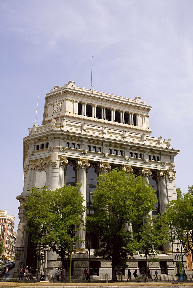 Trees in front of a building, Madrid, Spain