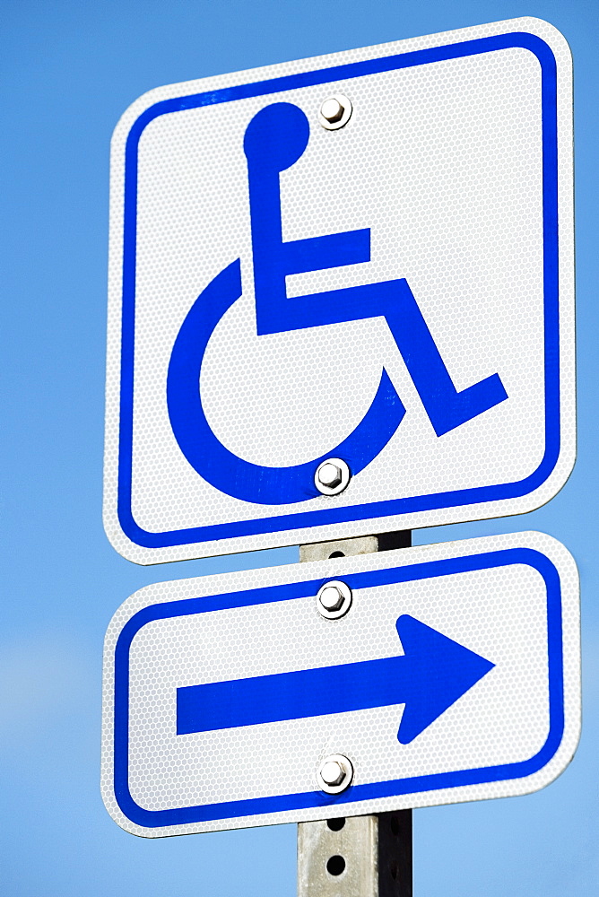 Low angle view of a disabled driver signboard on a pole, Kapaau, Big Island, Hawaii Islands, USA