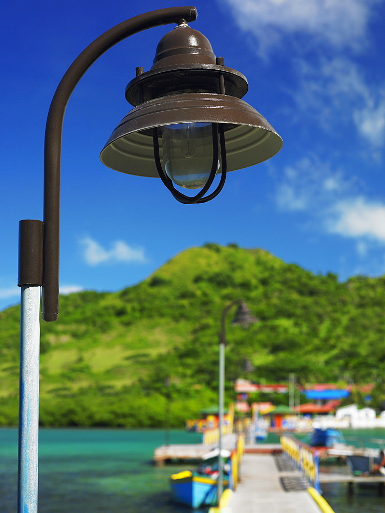 Close-up of a lamppost with mountains in the background, Lovebird's Bridge, Providencia, Providencia y Santa Catalina, San Andres y Providencia Department, Colombia