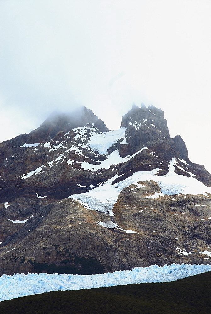 Fog over a mountain, Argentine Glaciers National Park, Lake Argentino, El Calafate, Patagonia, Argentina