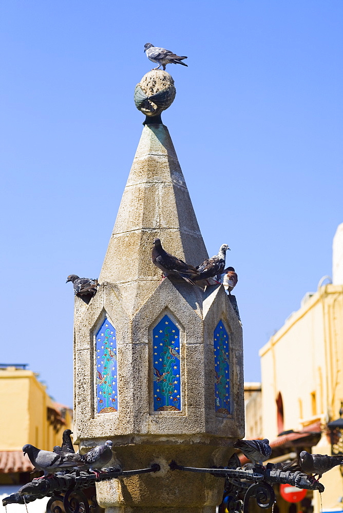 Fountain in the courtyard of a town, Sintrivani Fountain, Hippocrates Square, Rhodes, Dodecanese Islands, Greece