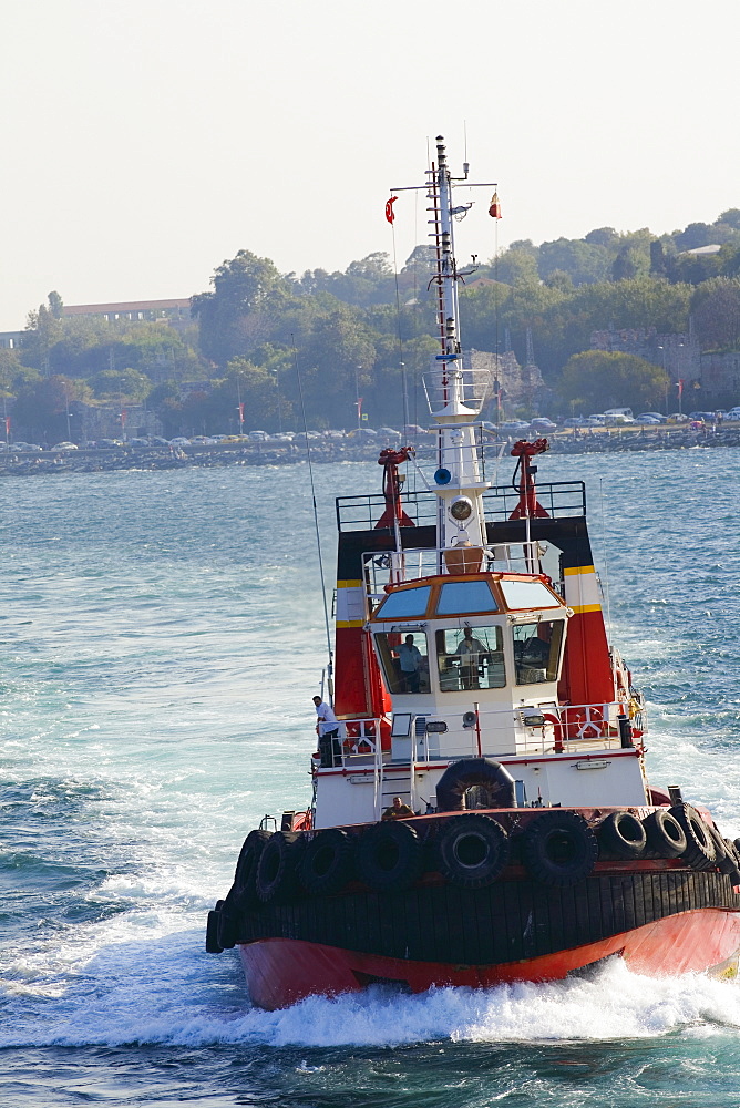 Tugboat moving in a river, Athens, Greece