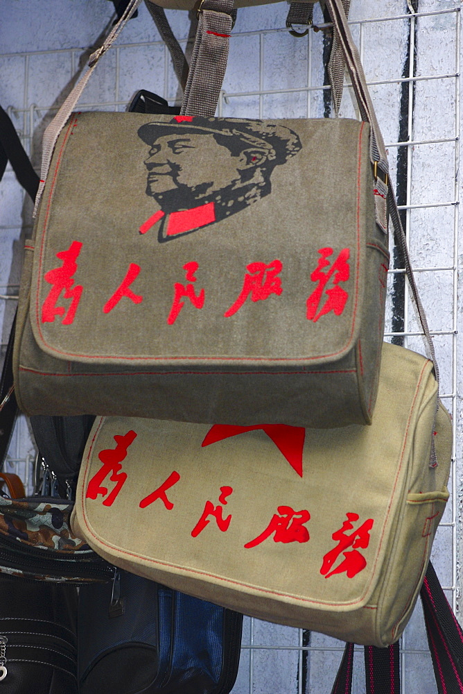 Close-up of bags hanging on a grille, Beijing, China