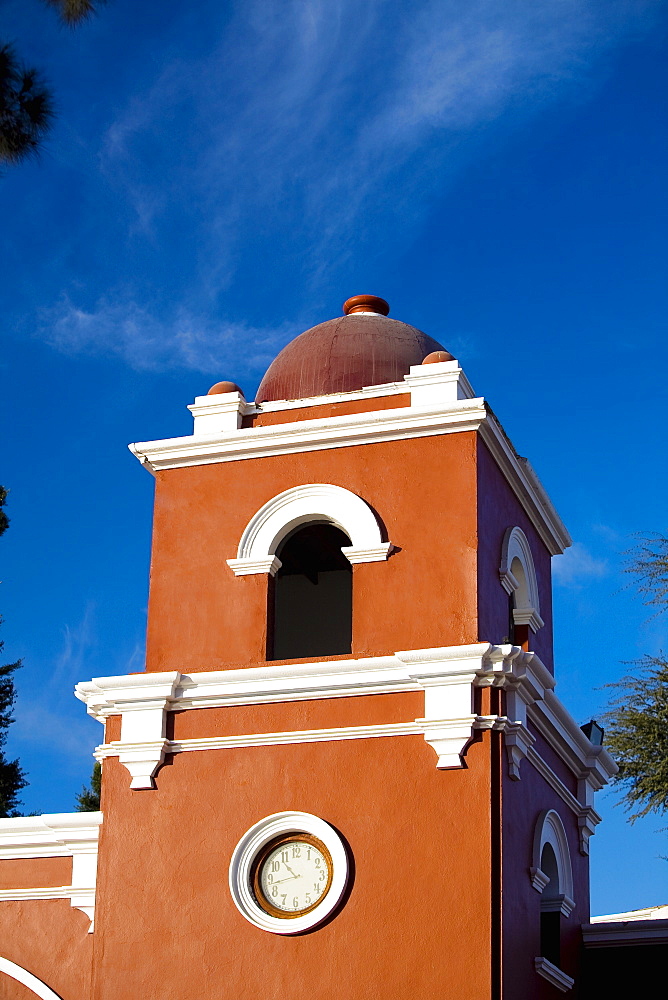 Low angle view of a clock tower, Hotel Mossone, Huacachina, Ica, Ica Region, Peru