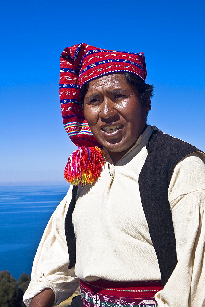 Close-up of a young man wearing headdress, Taquile Island, Lake Titicaca, Puno, Peru