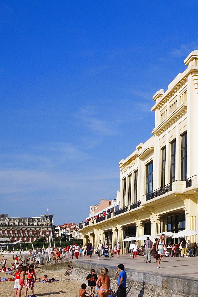 Group of people in front of a hotel, Casino Municipal, Hotel Du Palais, Grande Plage, Biarritz, France