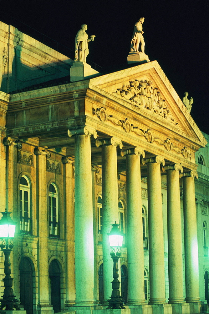 Building lit up at night, San Carlos Opera House, Lisbon, Portugal