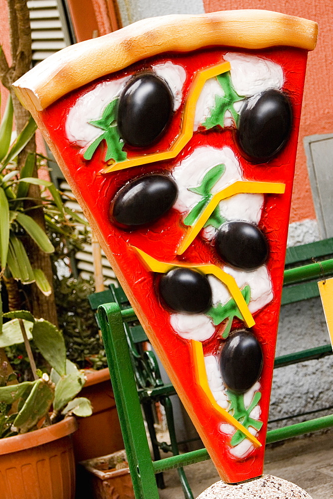 Pizza sculpture in front of a restaurant, Parco Nazionale delle Cinque Terre, Manarola, La Spezia, Italy