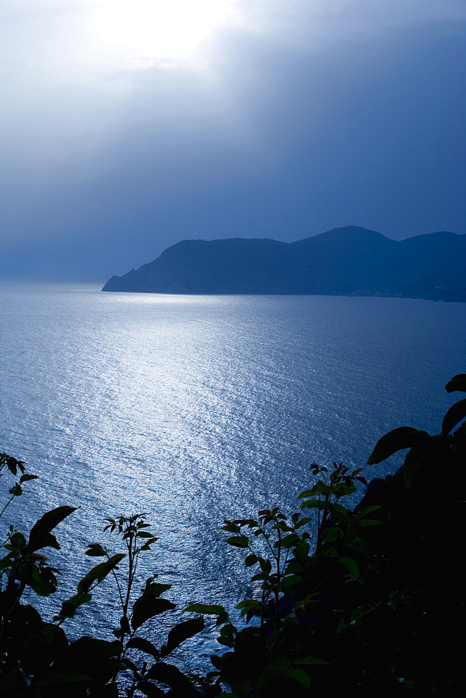 Silhouette of a mountain at the seaside, Italian Riviera, Cinque Terre National Park, Mar Ligure, Cinque Terre, La Spezia, Liguria, Italy