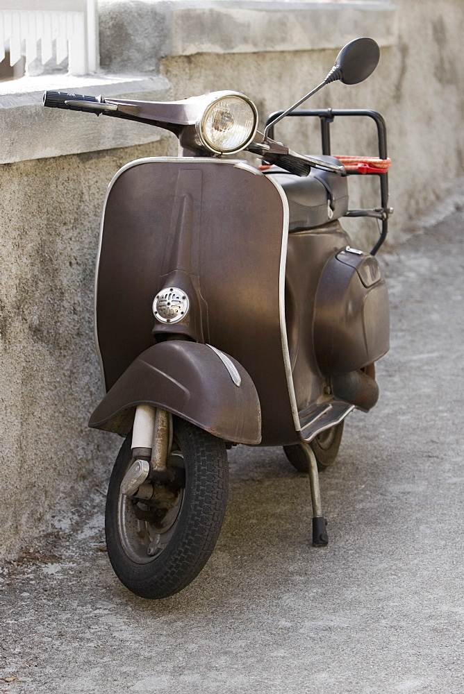 Motor scooter near a wall, Italian Riviera, Santa Margherita Ligure, Genoa, Liguria, Italy