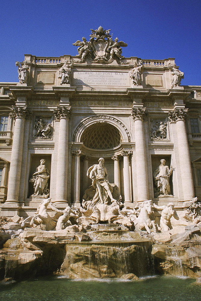 Statues in front of a building, Trevi Fountain, Rome, Italy